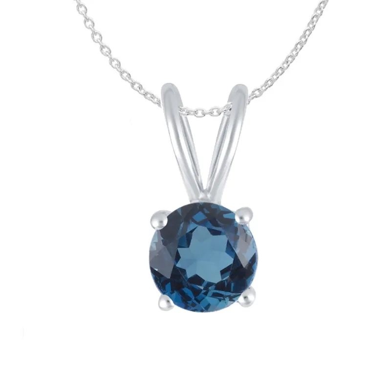 Set of Sterling Silver Pendant and Earring in Natural London Blue Topaz with 18" Chain sold by Zulily
