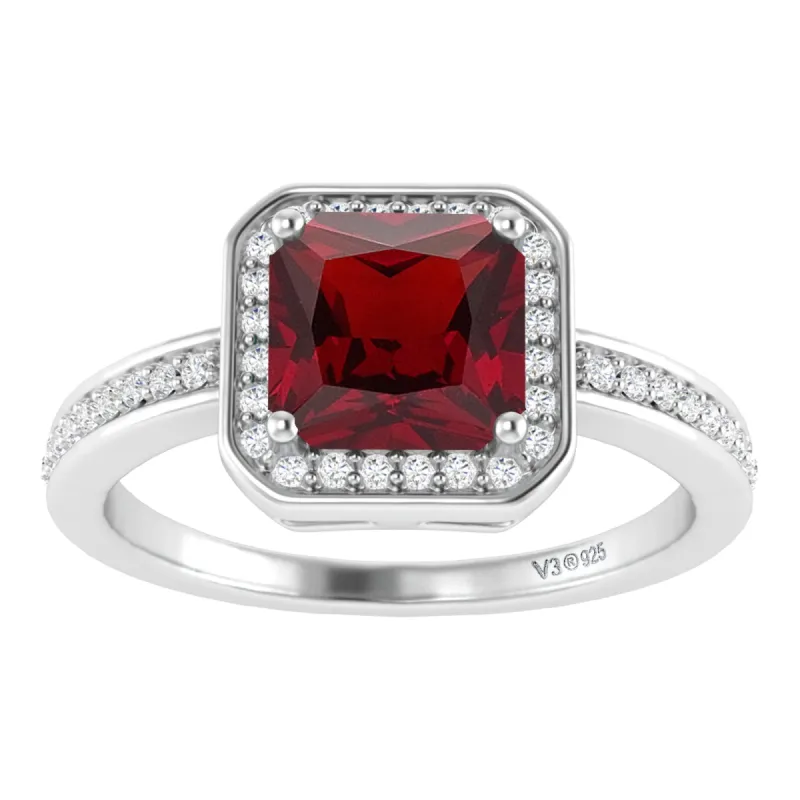 Sterling Silver With Natural Garnet and White Topaz Halo Ring sold by Zulily