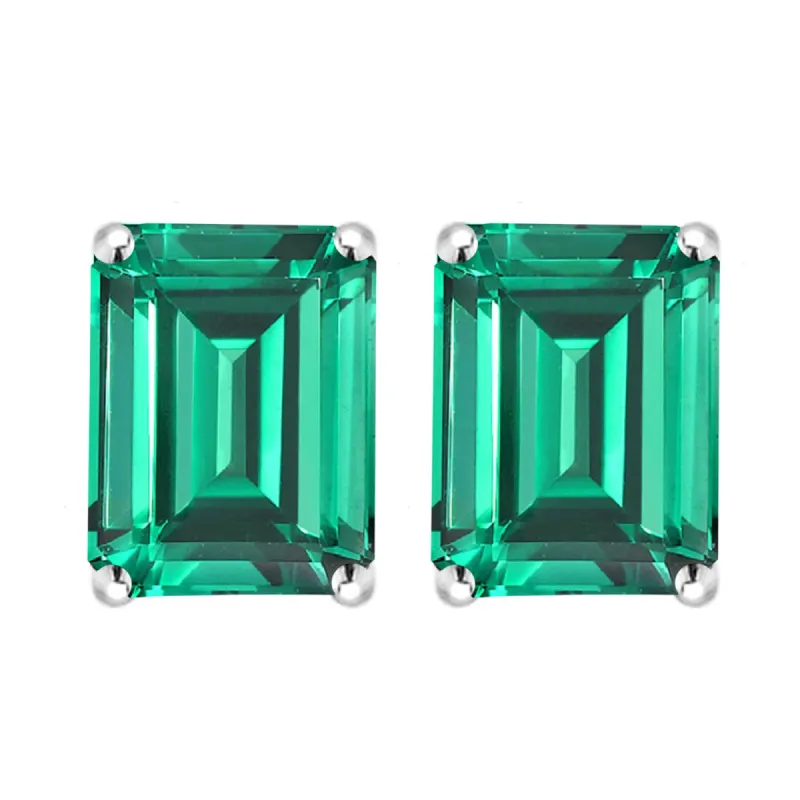 Sterling Silver with Emerald Stud Earrings sold by Zulily
