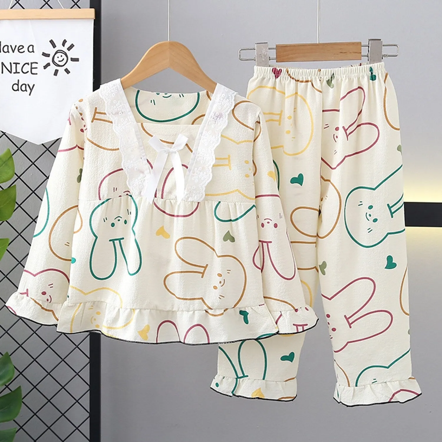 Cream Bunny Ruffle-Accent Loungewear Set sold by Zulily