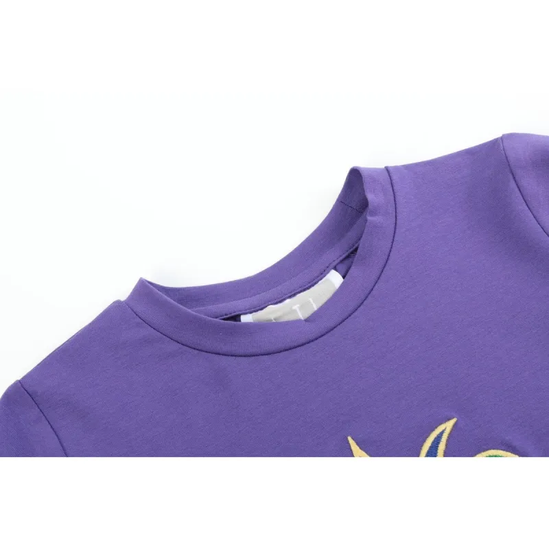 Purple Mardi Gras Applique Shirt and Shorts Set sold by Zulily