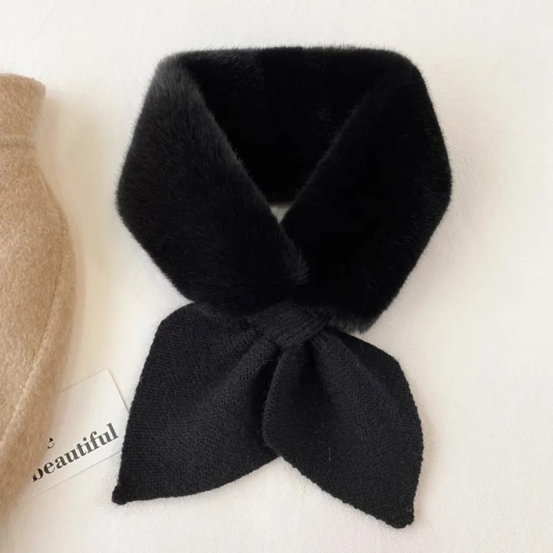 Black Plush Cross Scarf sold by Zulily