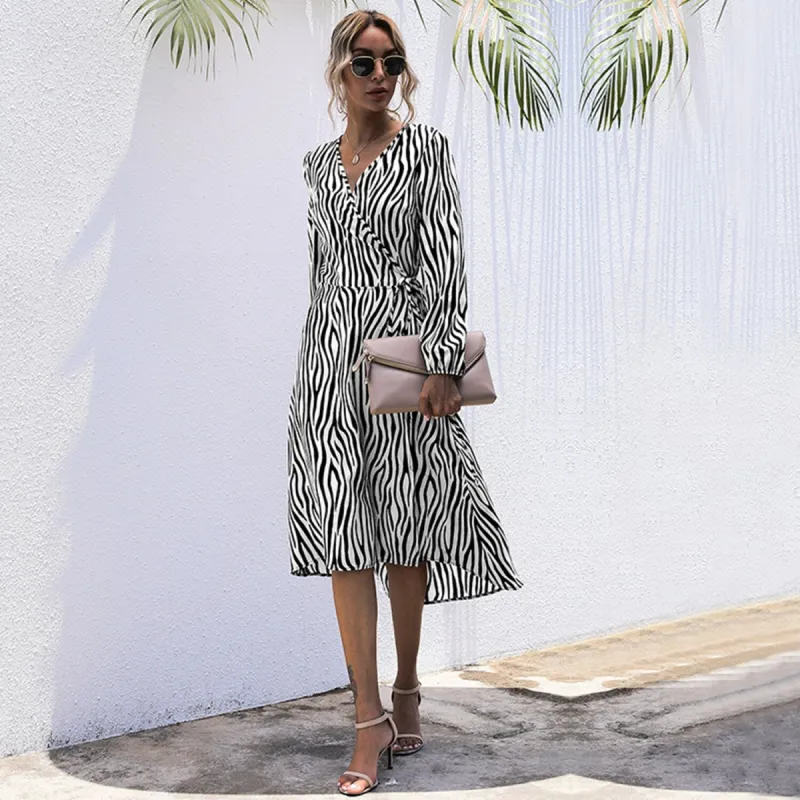 Black Zebra Print Wrap Dress sold by Zulily