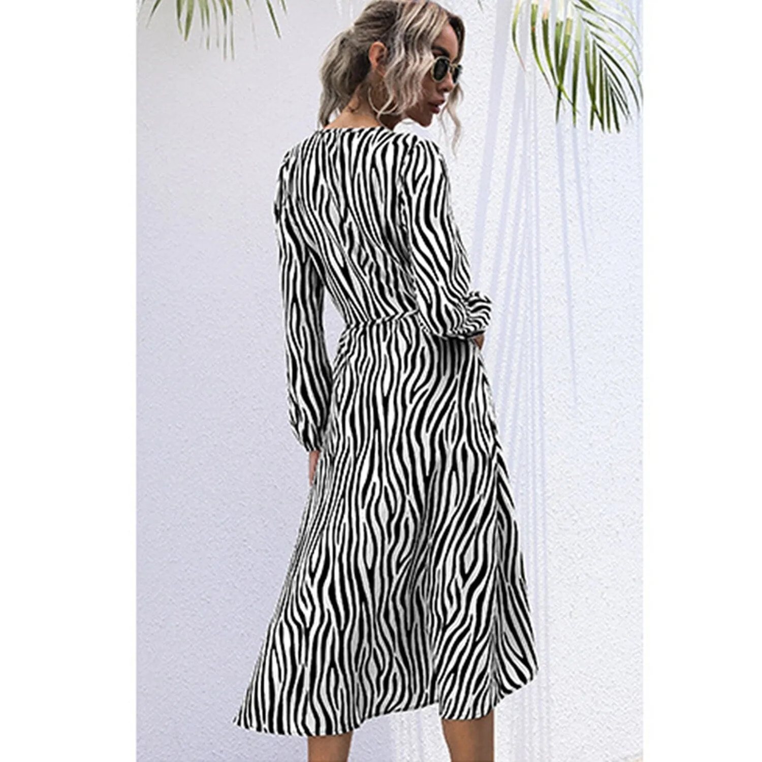 Black Zebra Print Wrap Dress sold by Zulily product image thumbnail 3