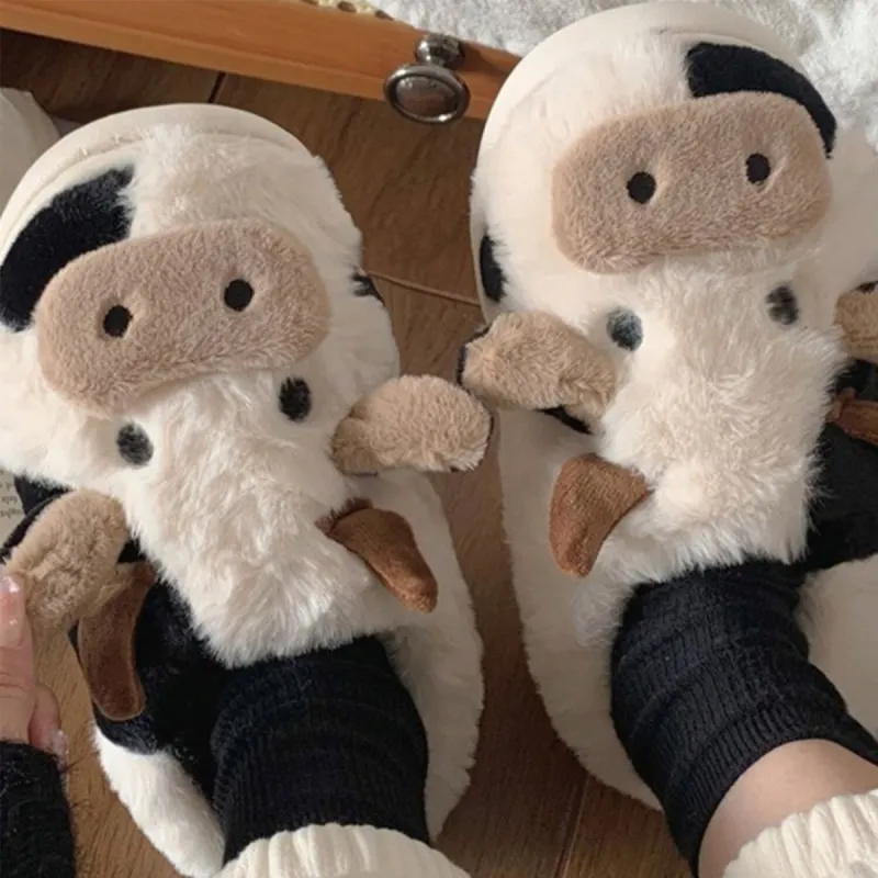 Black Dairy Cow Plush Slippers sold by Zulily