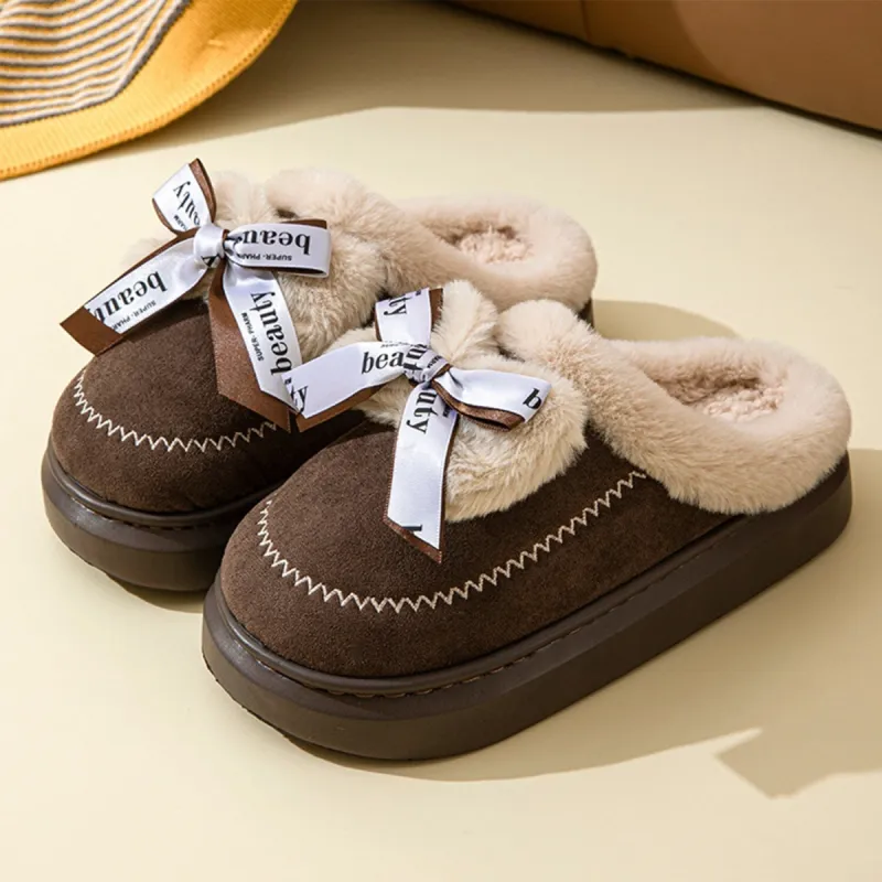 Dark Coffee Bow Plush Slippers sold by Zulily