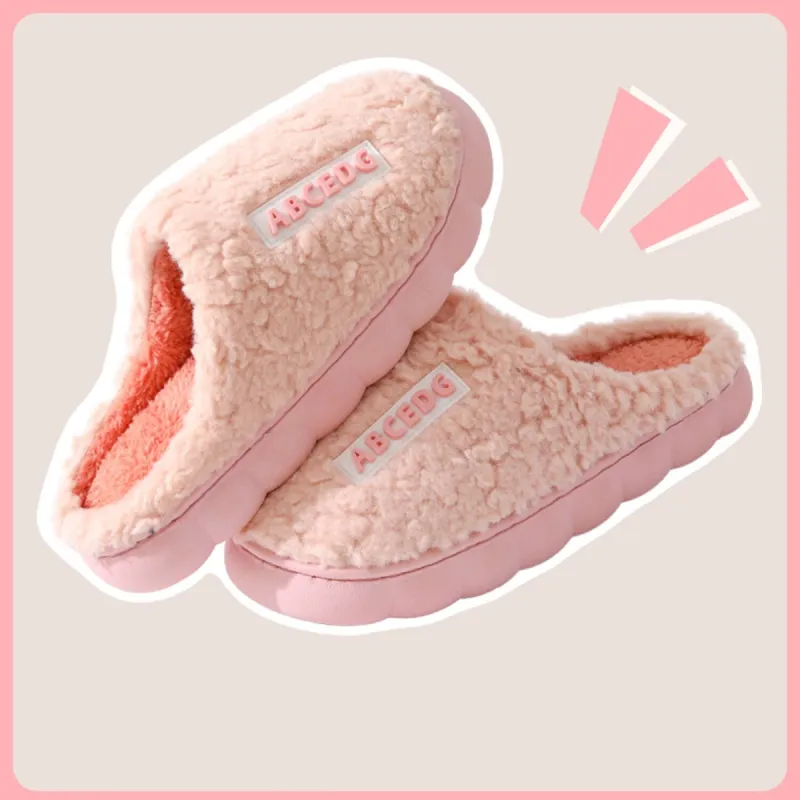 Pink Plush Slippers sold by Zulily