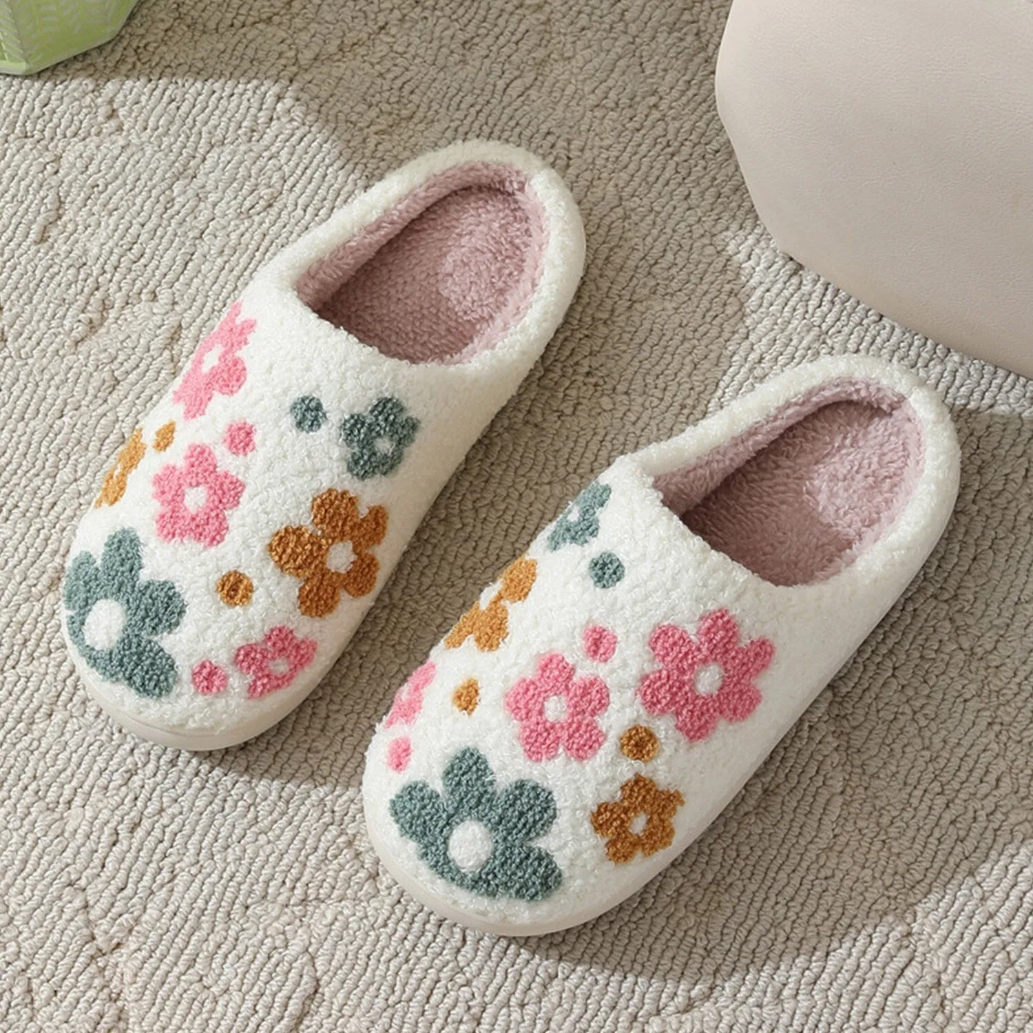 White & Pink Floral Plush Slippers sold by Zulily