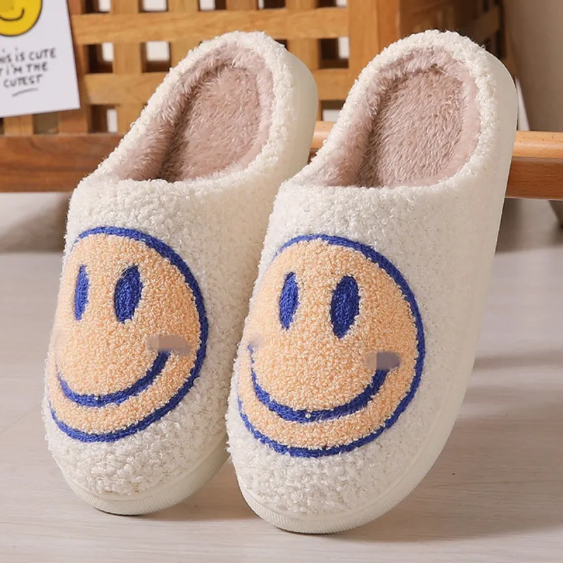 White & Light Yellow Smiley Face Plush Slippers sold by Zulily