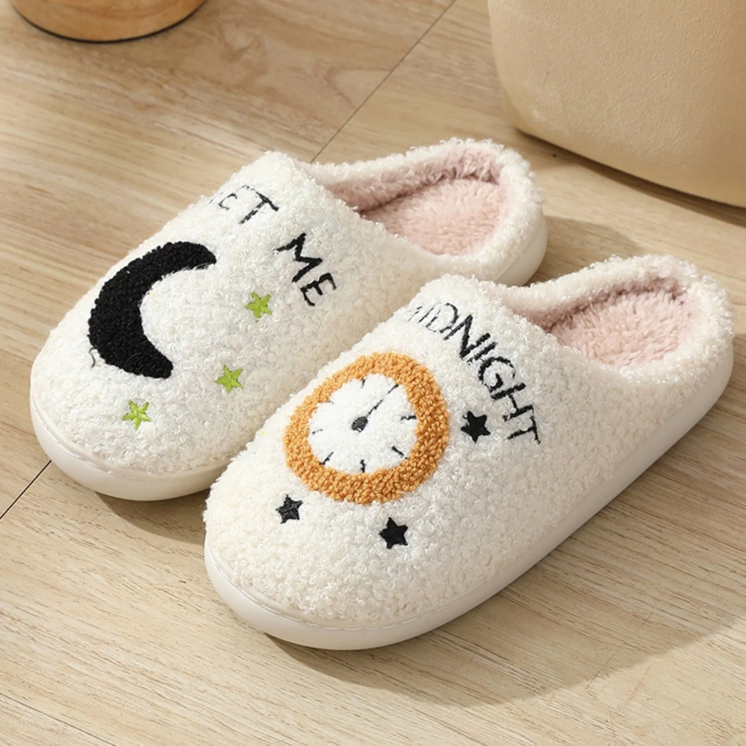 White Moon & Clock Plush Slippers sold by Zulily