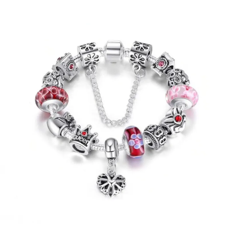 Silvertone Pink Charm Bracelet With Heart Charm sold by Zulily
