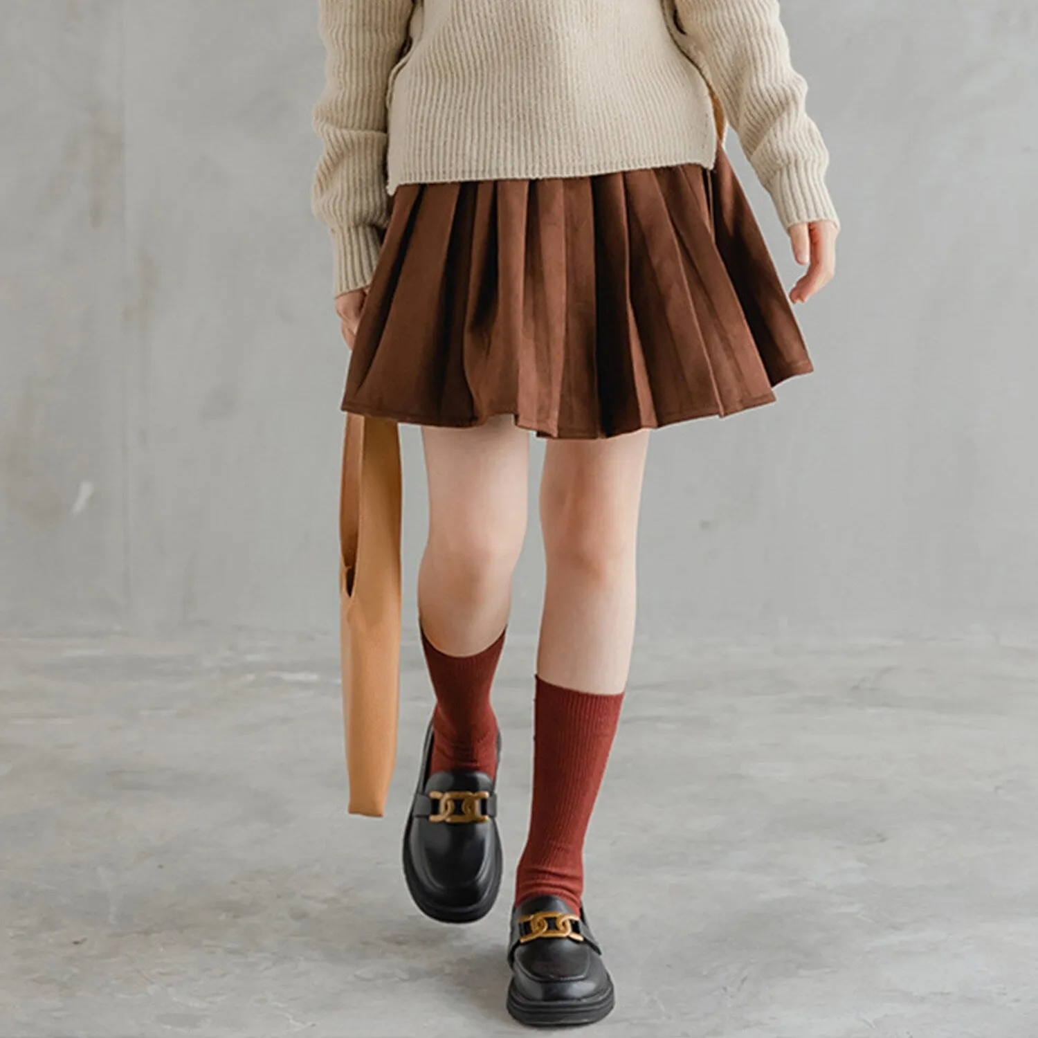 Brown Pleated Skirt sold by Zulily