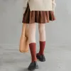 Brown Pleated Skirt sold by Zulily