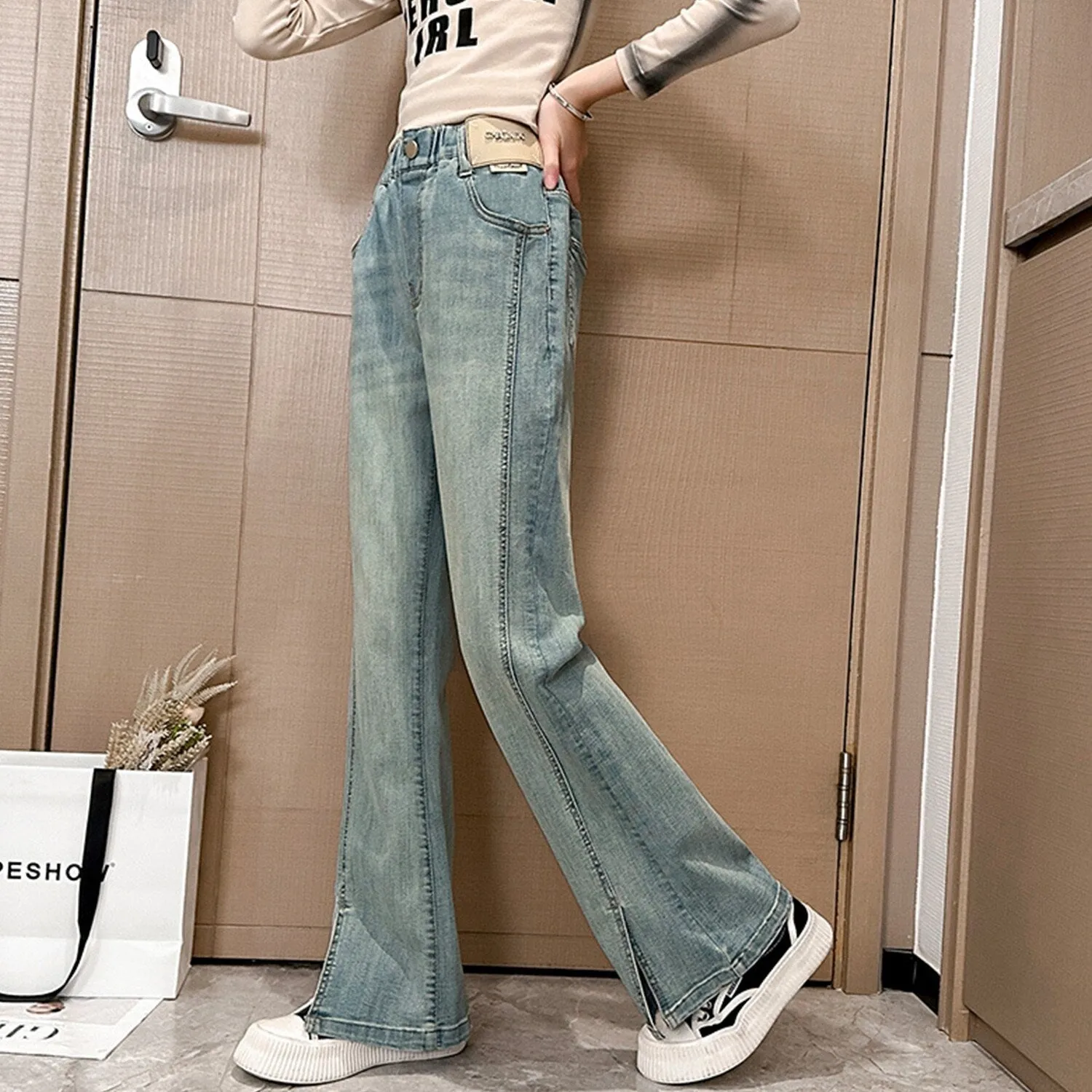 Light Blue Denim Slit Flared Pants sold by Zulily product image thumbnail 3