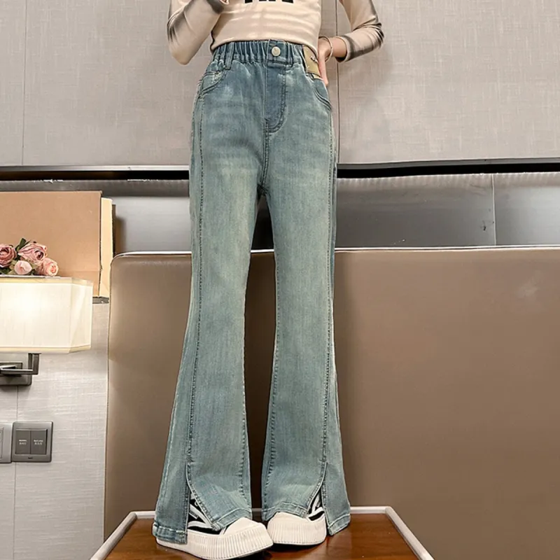 Light Blue Denim Slit Flared Pants sold by Zulily