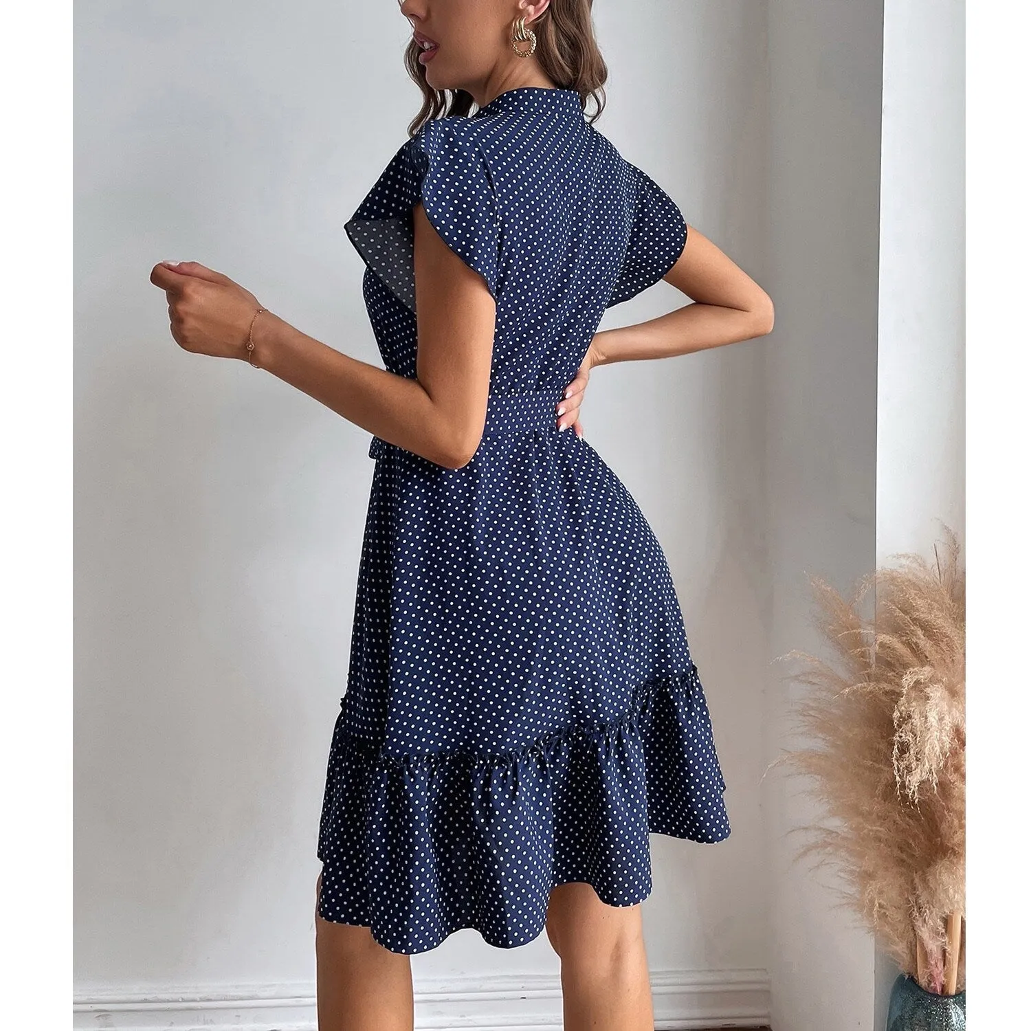 Navy Polka Dot Ruffle Sleeve Dress sold by Zulily product image thumbnail 4