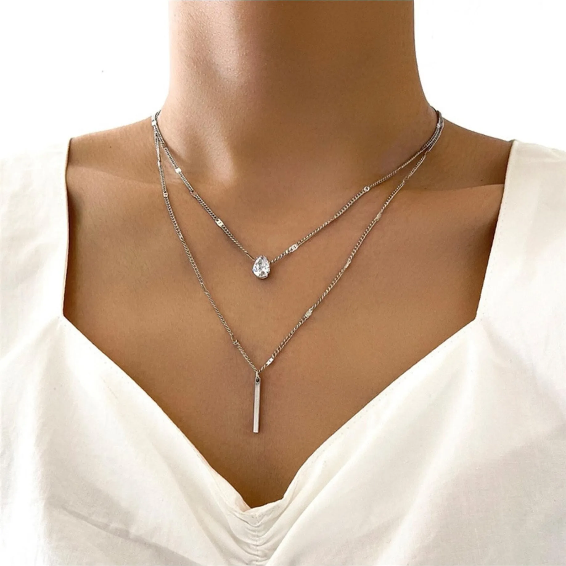 Silver Layered Bar And Teardrop Necklace With Cubic Zirconia sold by Zulily