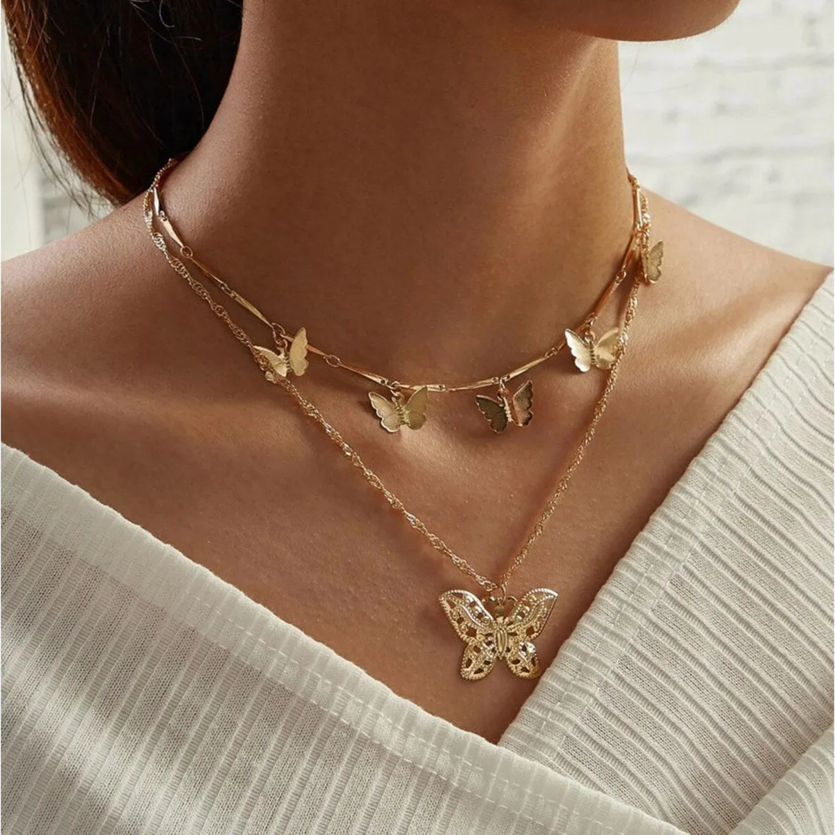 Goldtone Layered Butterflies Necklace - Gold sold by Zulily product image thumbnail 2