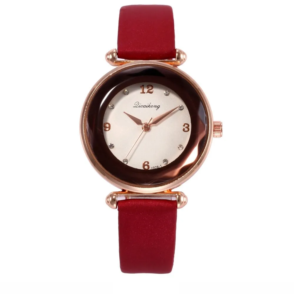 Red Faceted Bezel Faux Leather Watch sold by Zulily