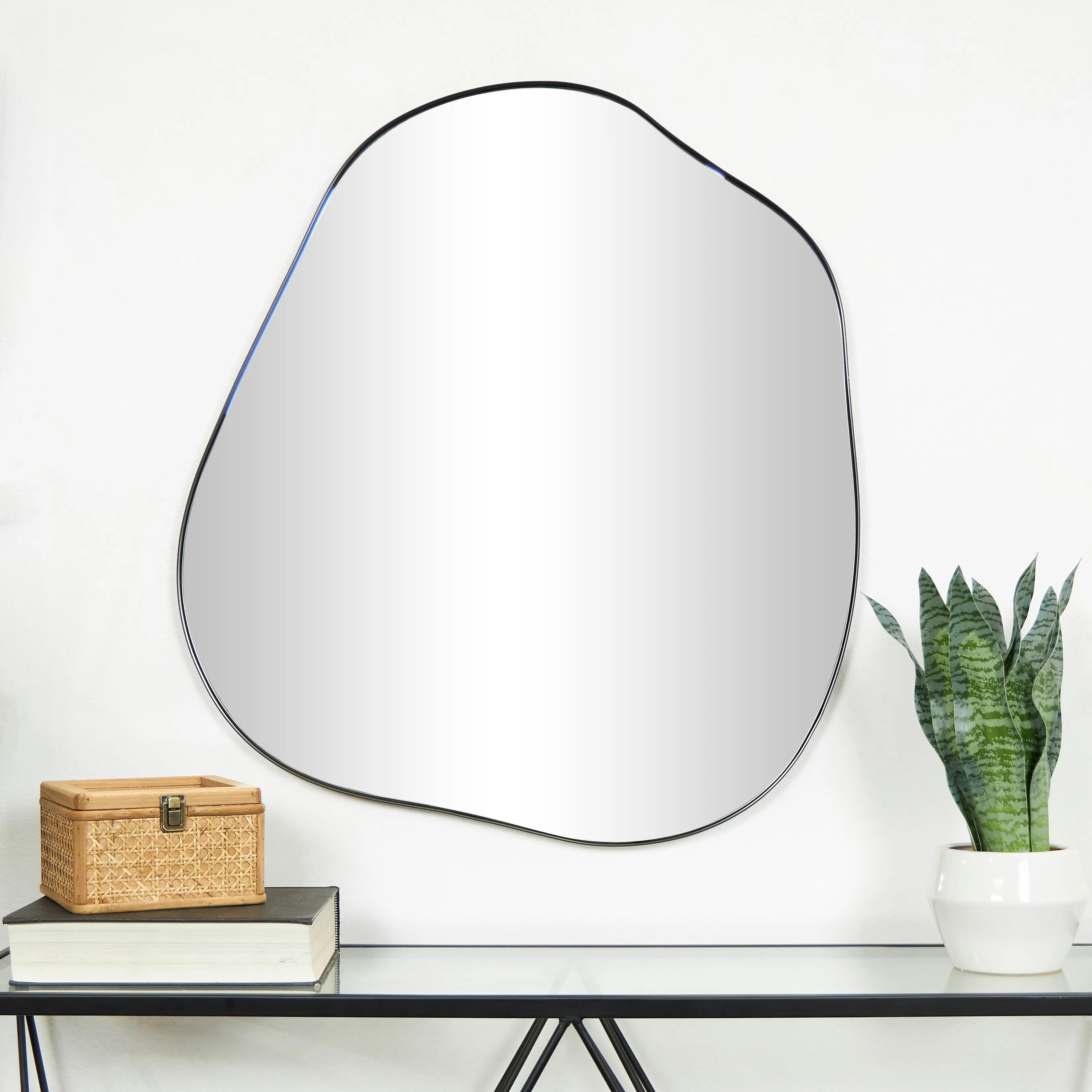CosmoLiving by Cosmopolitan Black Metal Wavy Abstract Wall Mirror sold by Zulily