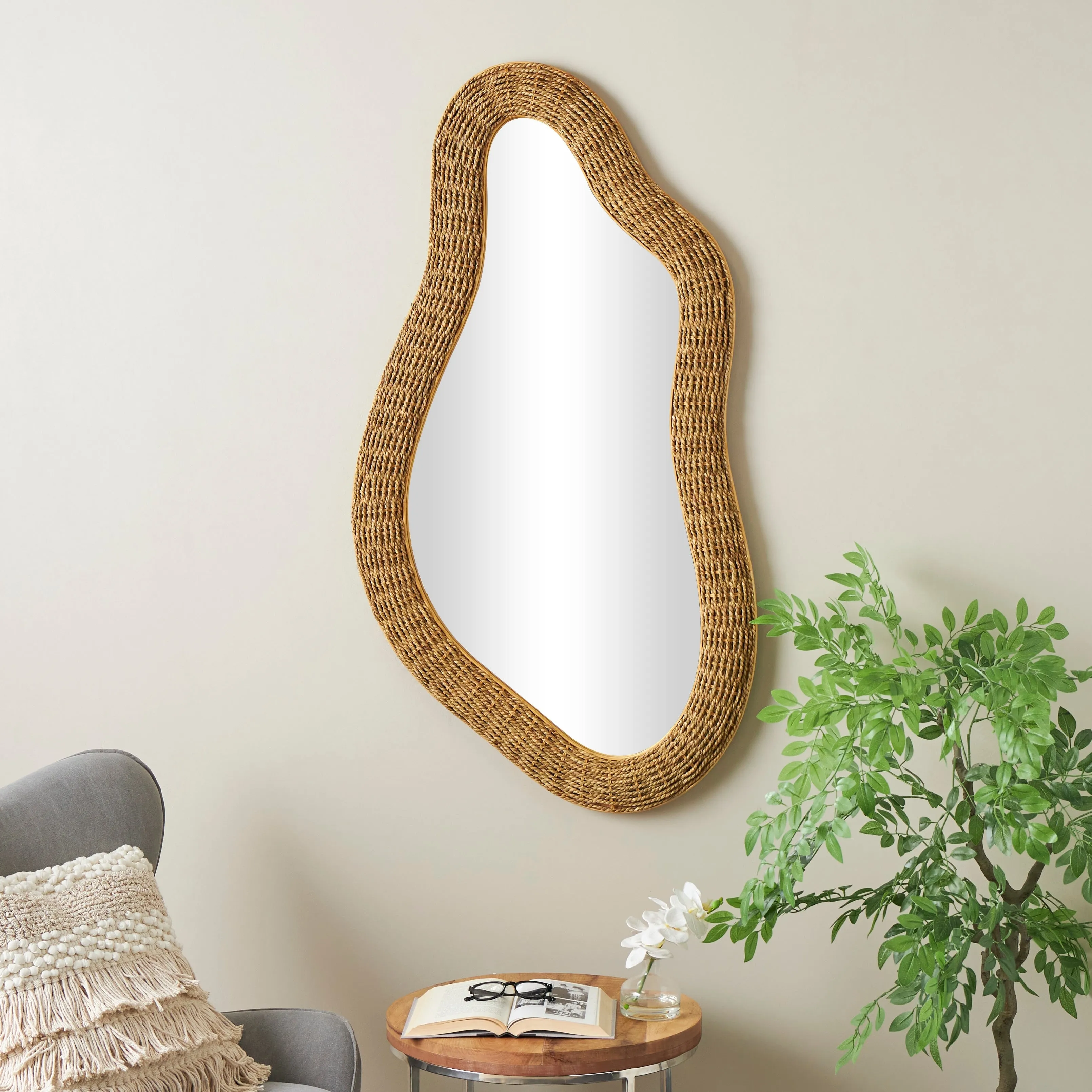 Brown Seagrass Handmade Woven Oval Abstract Room Wall Mirror sold by Zulily