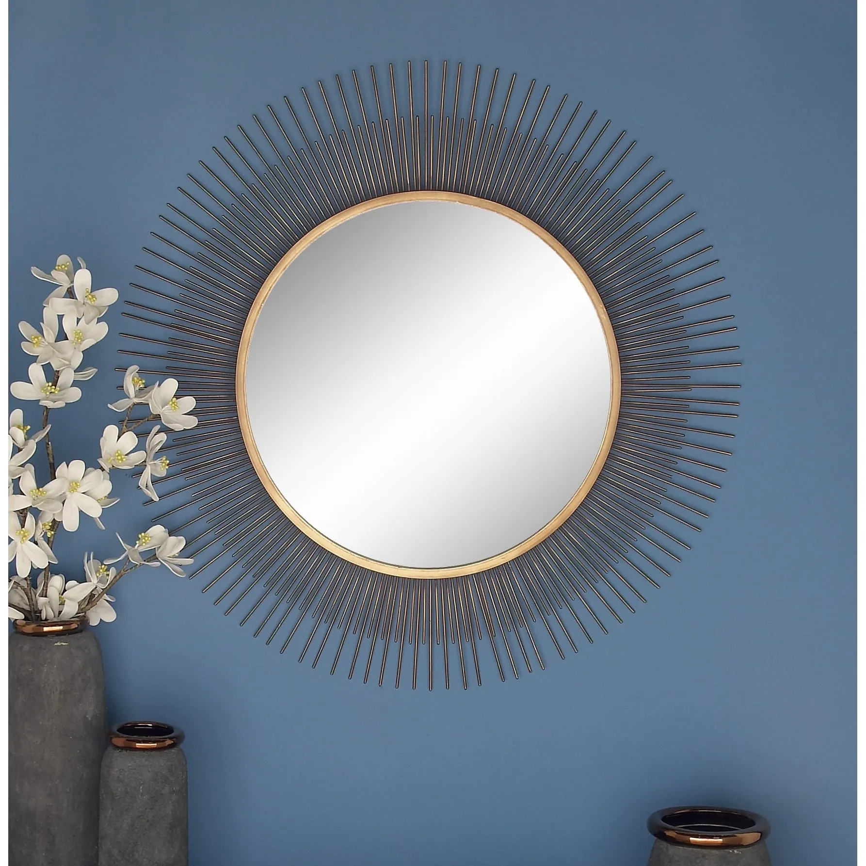 Gold Metal Starburst Room Wall Mirror sold by Zulily
