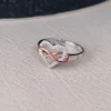 Sterling Silver Rose Gold Two-Tone Infinity Ring sold by Zulily