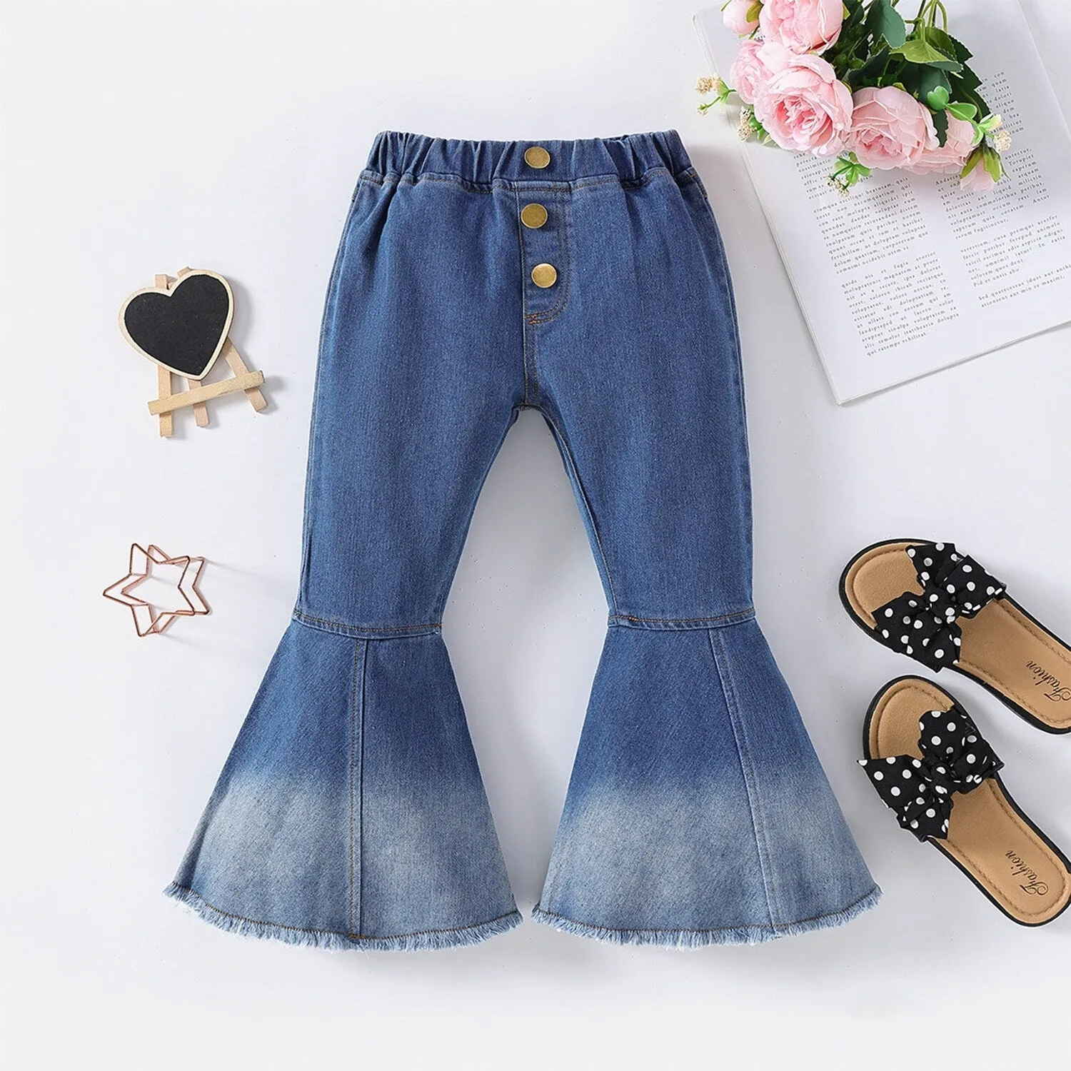 Blue Denim Flare Pants sold by Zulily