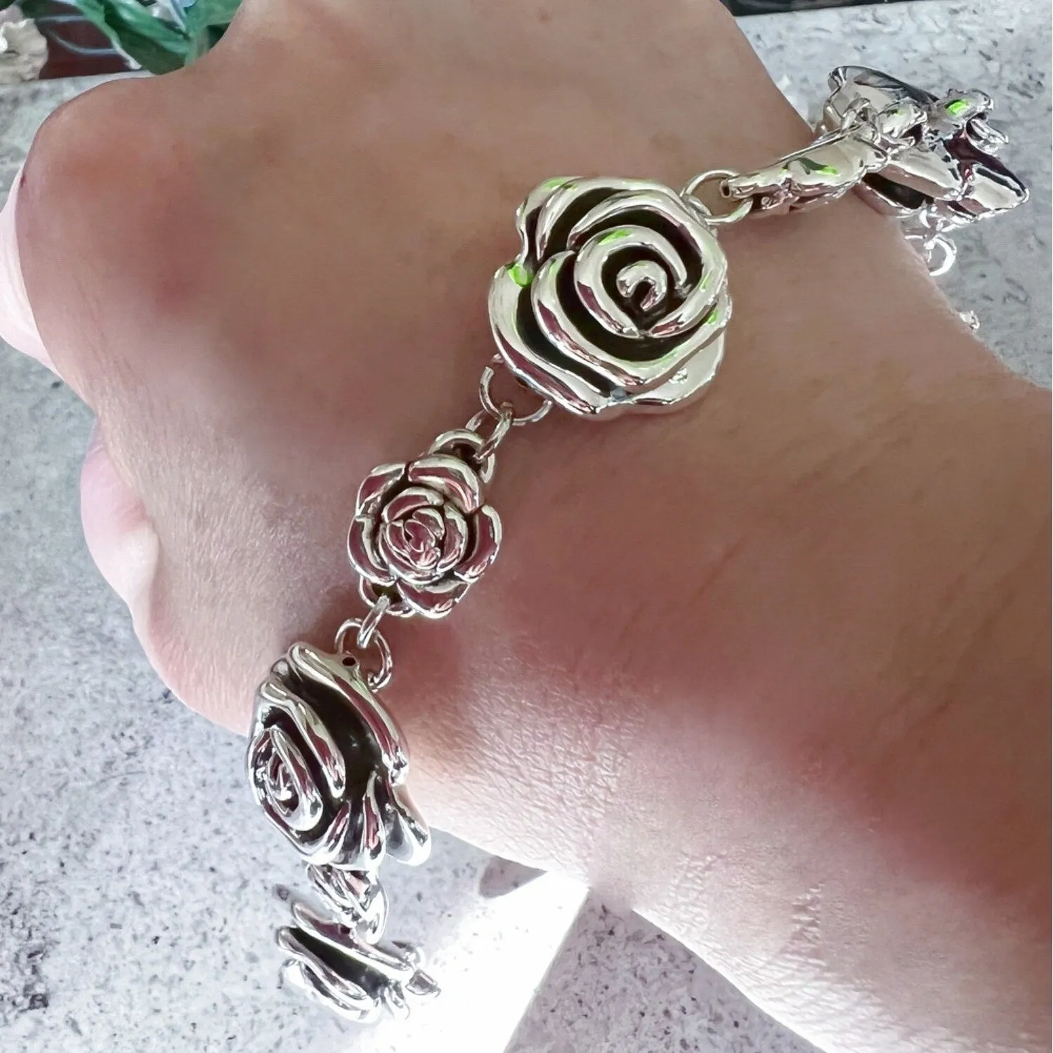 Sterling Silver Forming Rose Flower Link Bracelet sold by Zulily product image thumbnail 2