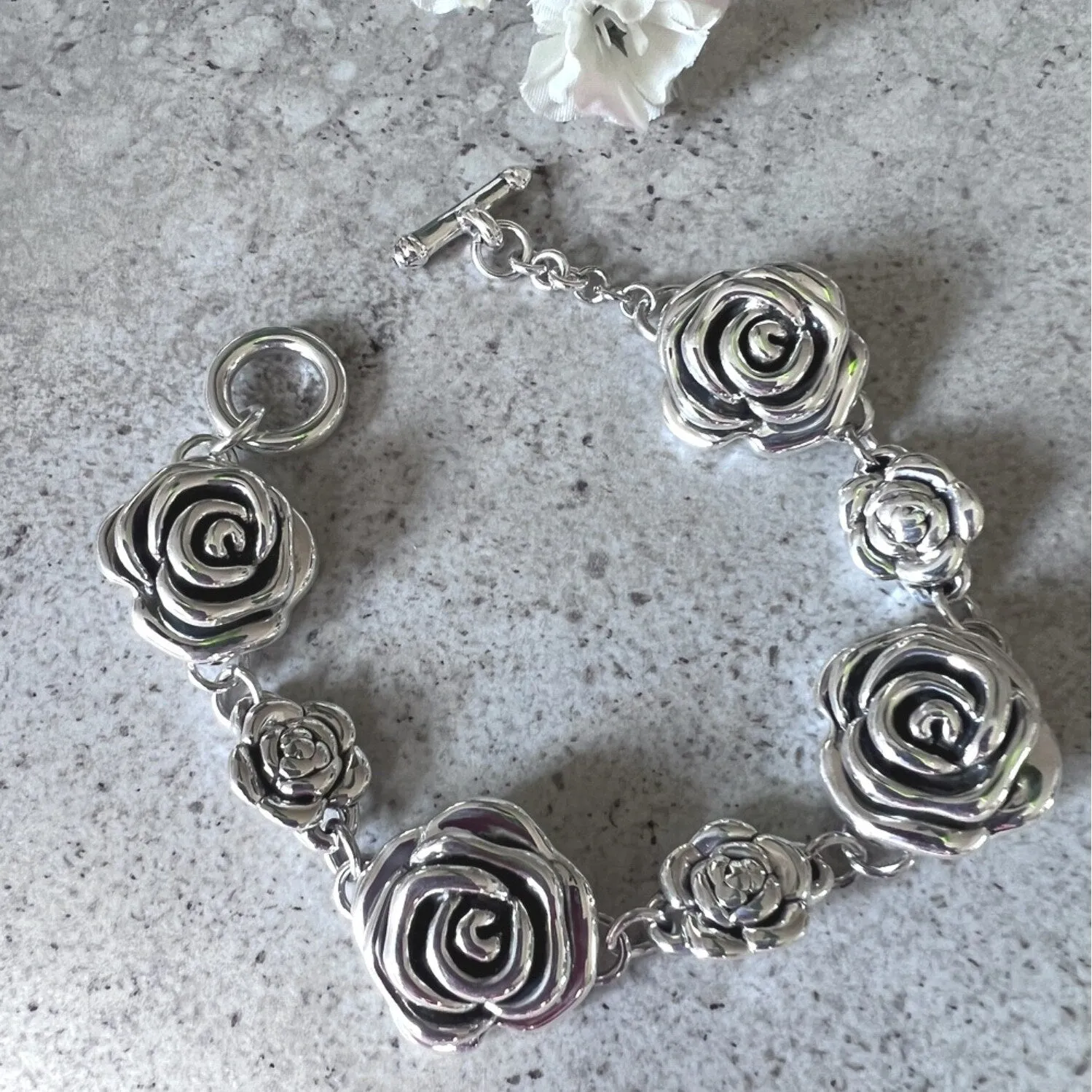 Sterling Silver Forming Rose Flower Link Bracelet sold by Zulily product image thumbnail 3