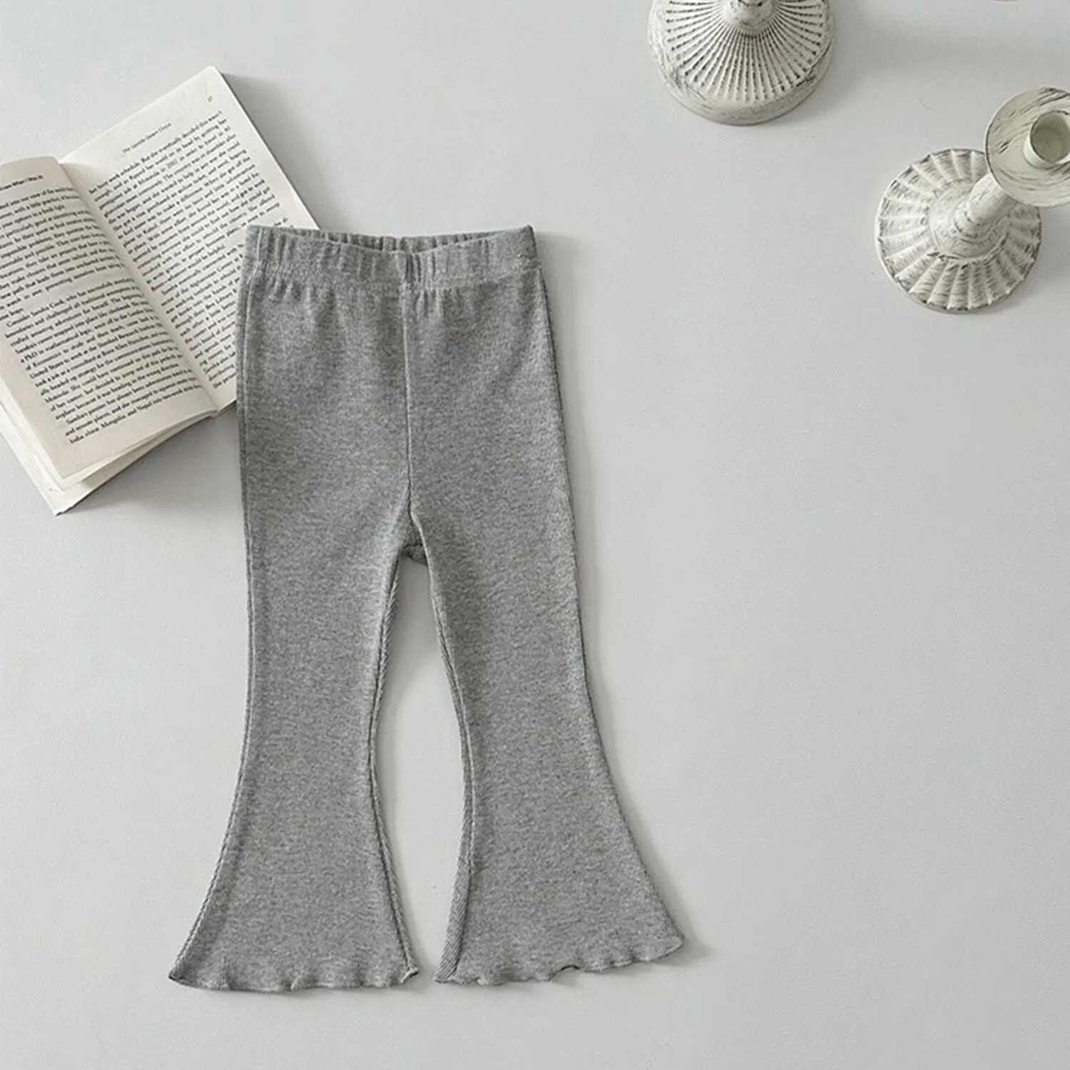 Grey Flared Pants sold by Zulily