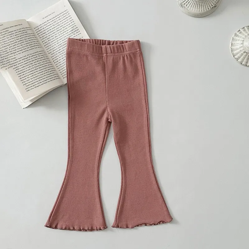 Dusty Coral Flared Pants sold by Zulily