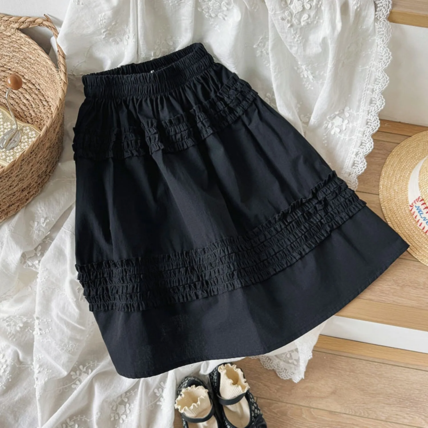 Black Ruffle-Accent Skirt sold by Zulily