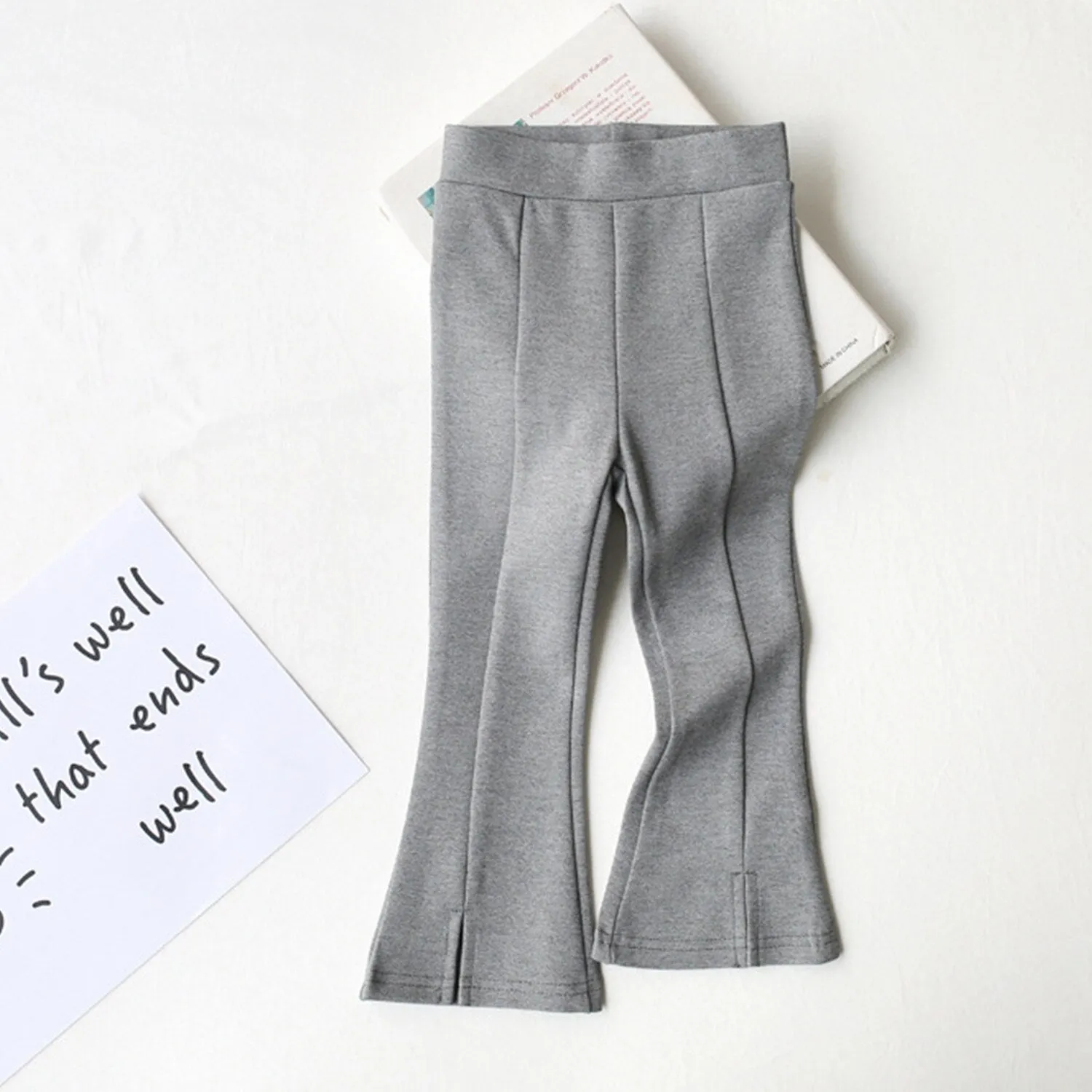 Grey Slit Flared Pants sold by Zulily