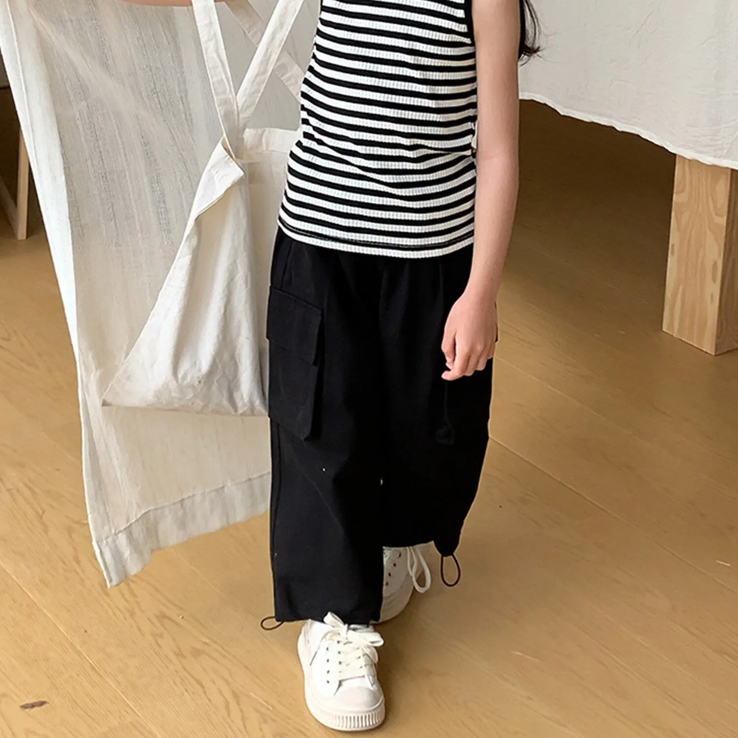 Black Cargo Pants sold by Zulily