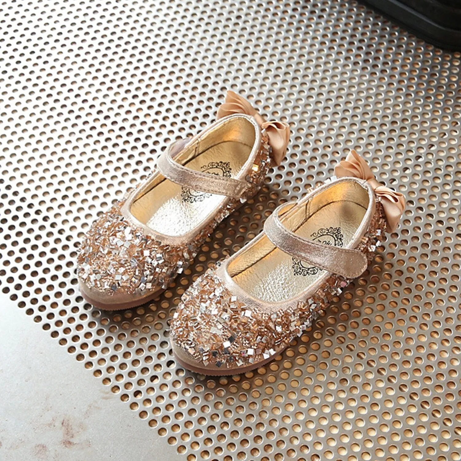 Gold Sequins Girls' Flat Shoes sold by Zulily