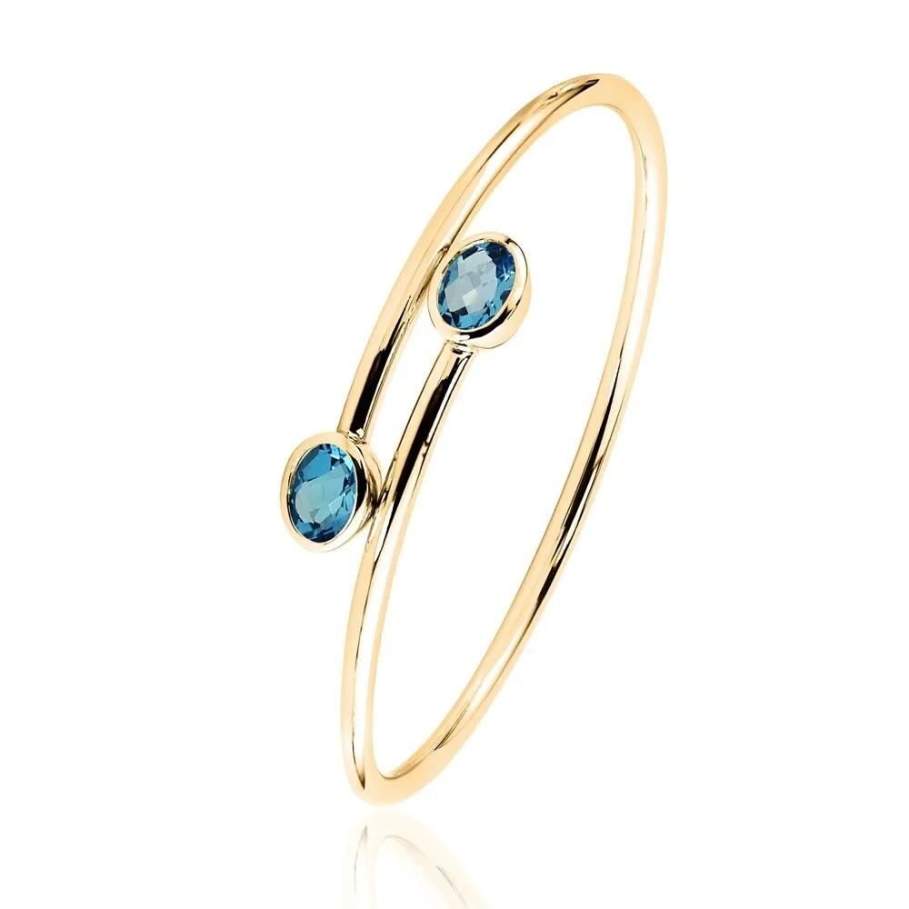 Auriya 2 3/4ct Oval Swiss Blue Topaz Bypass Bangle Bracelet Gold over Silver sold by Zulily product image thumbnail 5