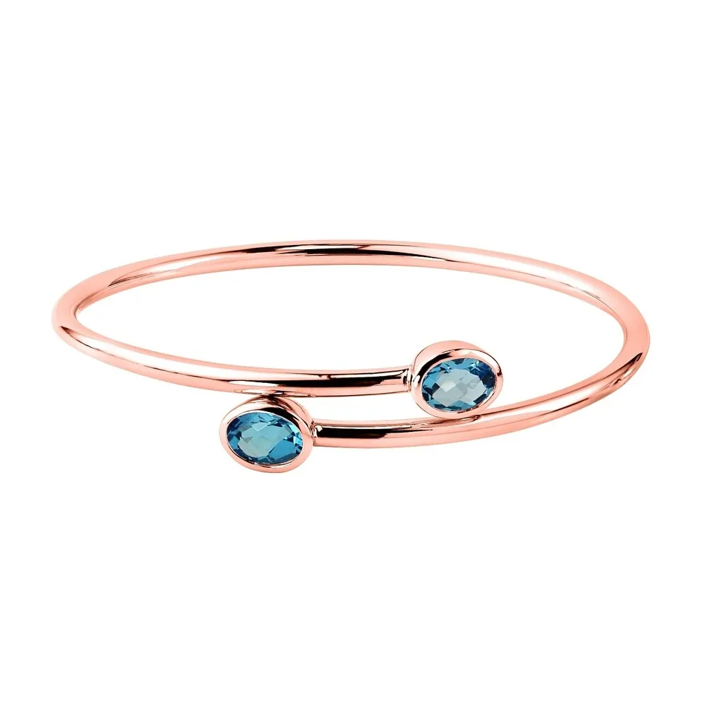 Auriya 2 3/4ct Oval Swiss Blue Topaz Bypass Bangle Bracelet Gold over Silver sold by Zulily product image thumbnail 3