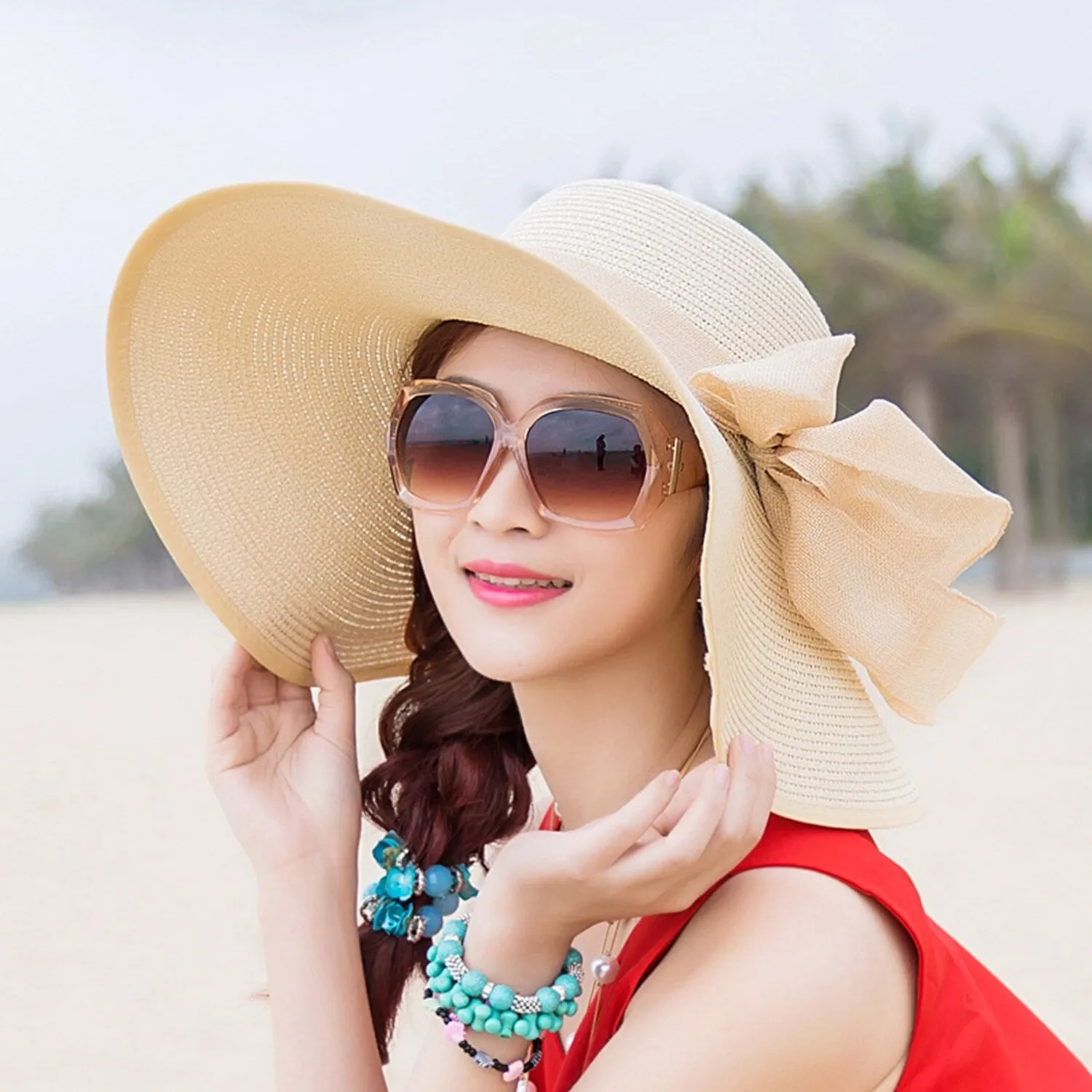 Beige Bow Sun Hat sold by Zulily