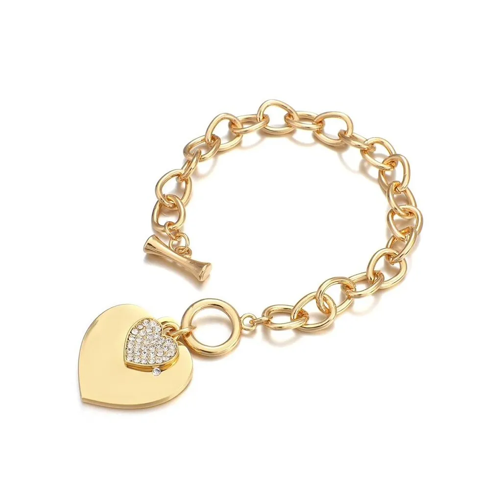 Goldtone Chain Bracelet With Heart Charm sold by Zulily