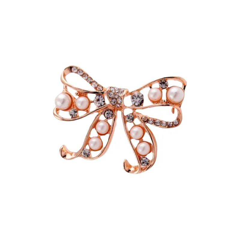 Goldtone Imitation Pearl Bow Brooch sold by Zulily