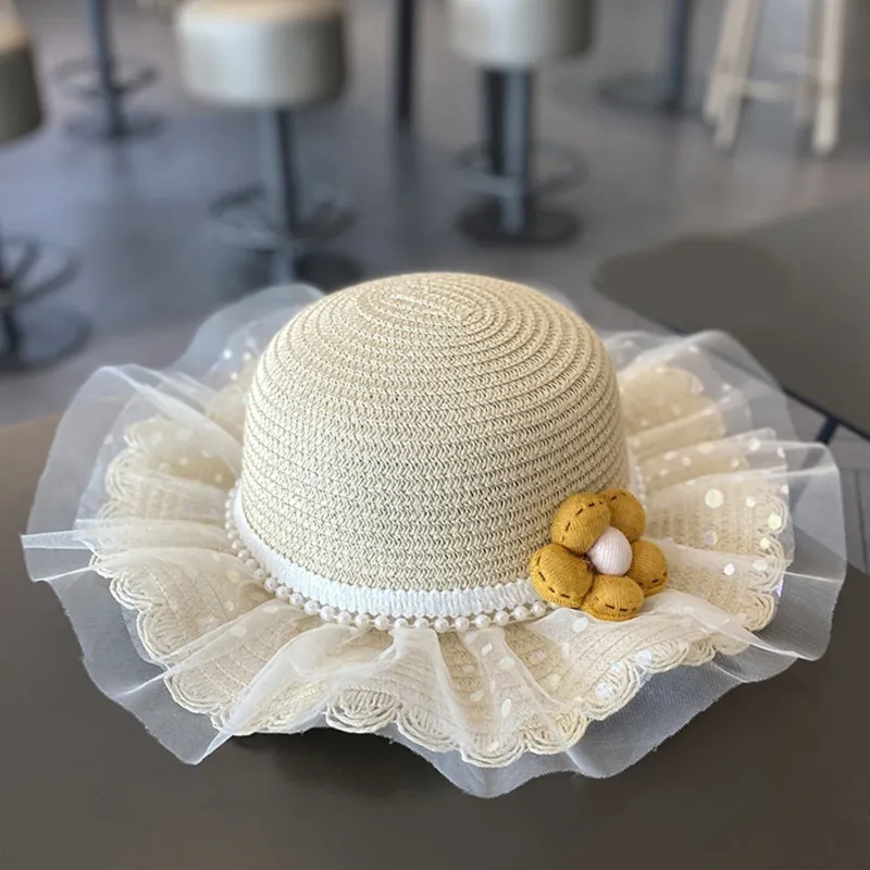 Beige Floral-Accent Tulle Sun Hat sold by Zulily