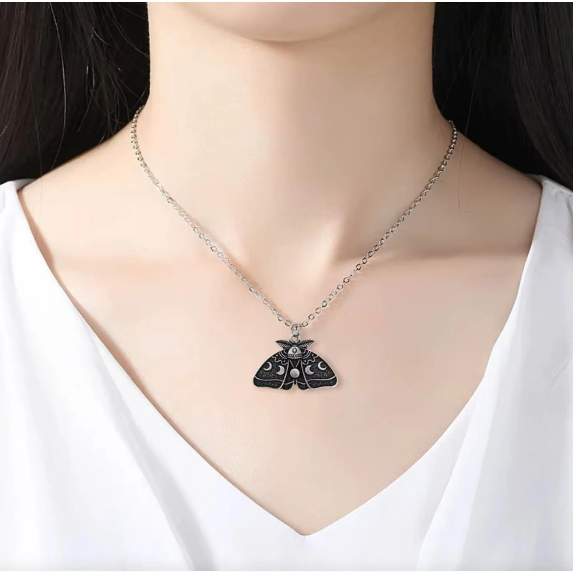 Silvertone Black Lunar Moth Necklace sold by Zulily product image thumbnail 3