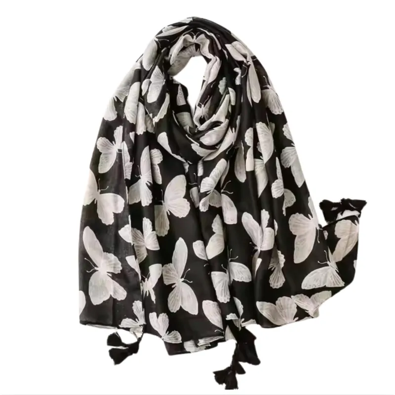 Chic Black Butterfly Scarf with Tassels sold by Zulily