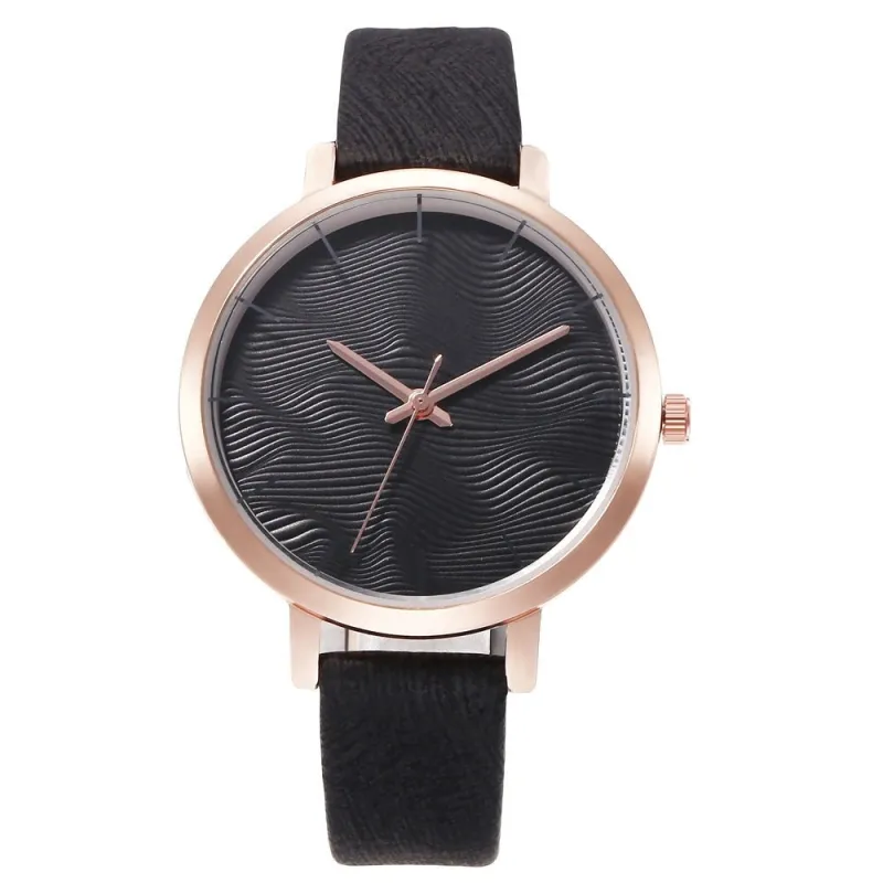 Black Goldtone Textured Face Watch sold by Zulily