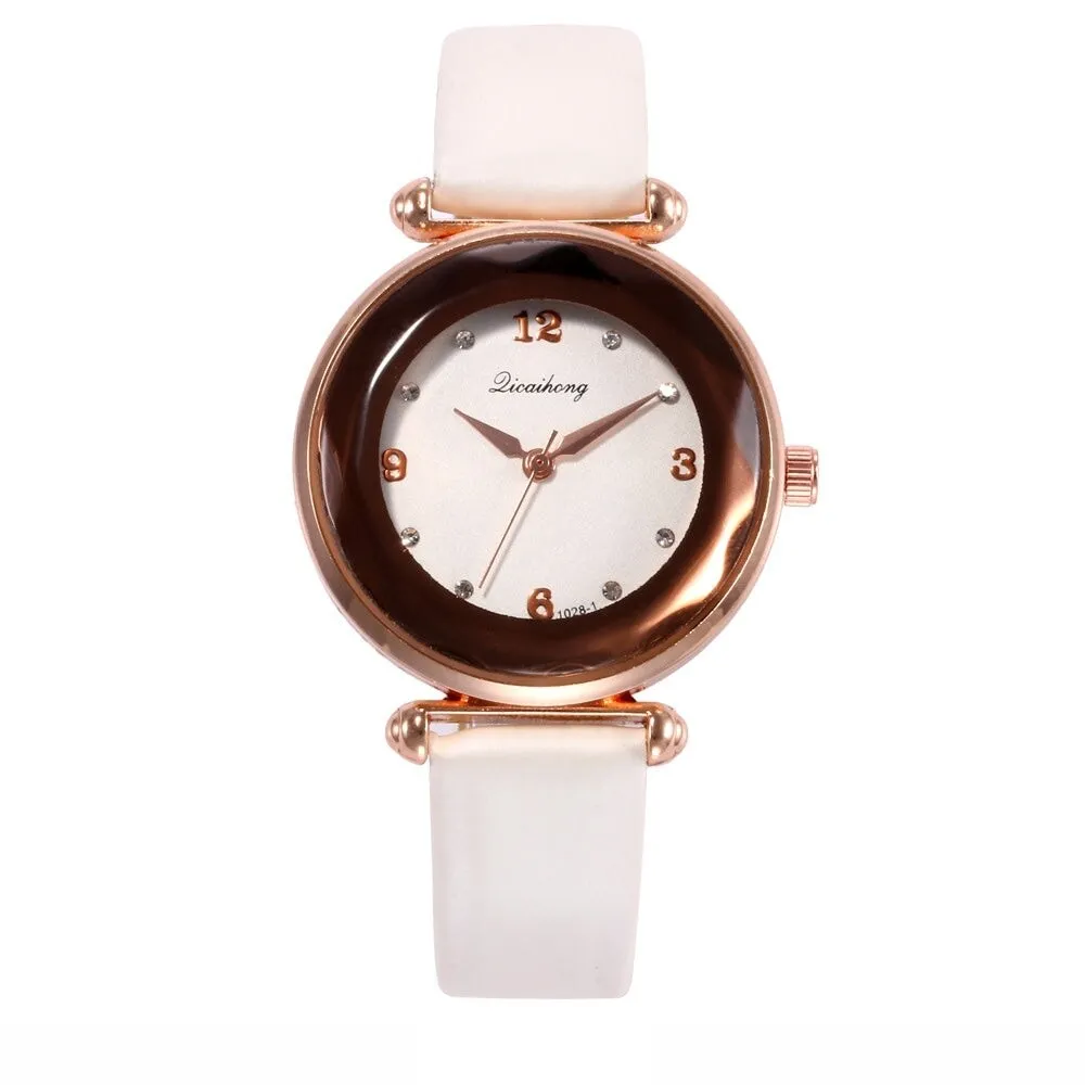 White Faceted Bezel Faux Leather Watch sold by Zulily