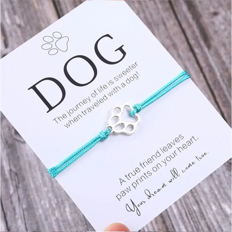 Turquoise Adjustable Bracelet With Silvertone Paw Print - 5" to 9" sold by Zulily