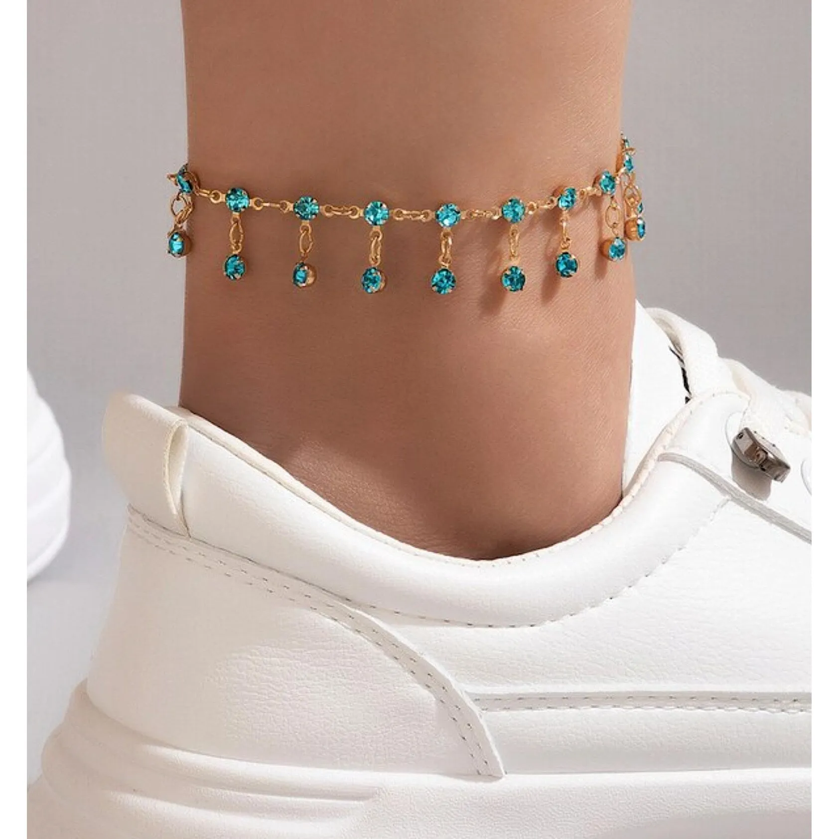 Goldtone Aqua Crystal Anklet sold by Zulily