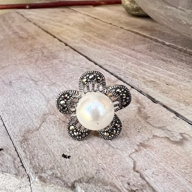 Marcasite and Sterling Silver Daisy- like Flower with Mother of Pearl Coating Pearl Ring sold by Zulily
