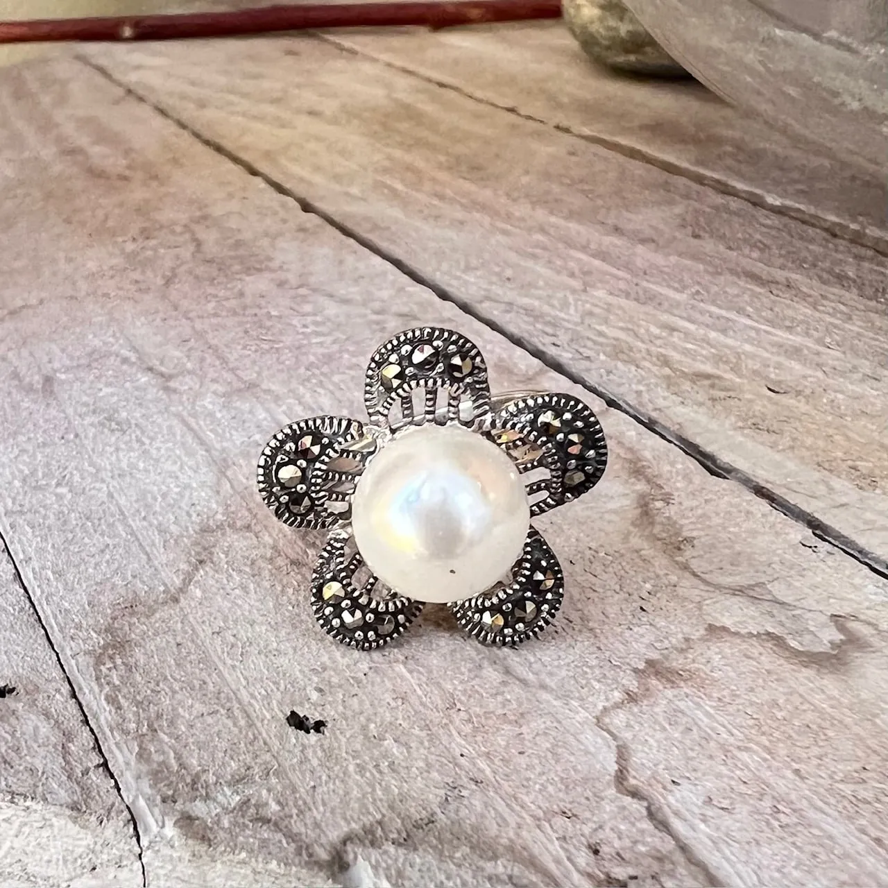 Marcasite and Sterling Silver Daisy- like Flower with Mother of Pearl Coating Pearl Ring sold by Zulily